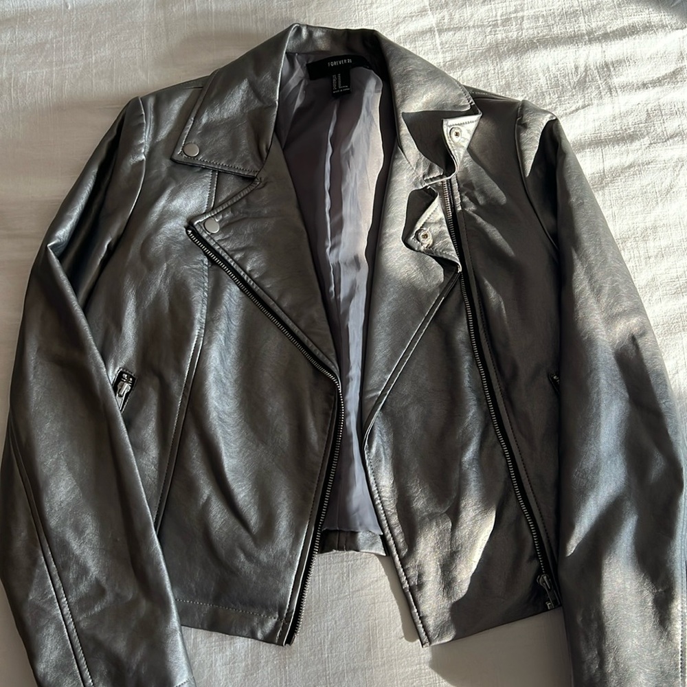 silver metallic forever 21 jacket with zipper and button detail